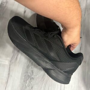 Women’s black adidas sneakers